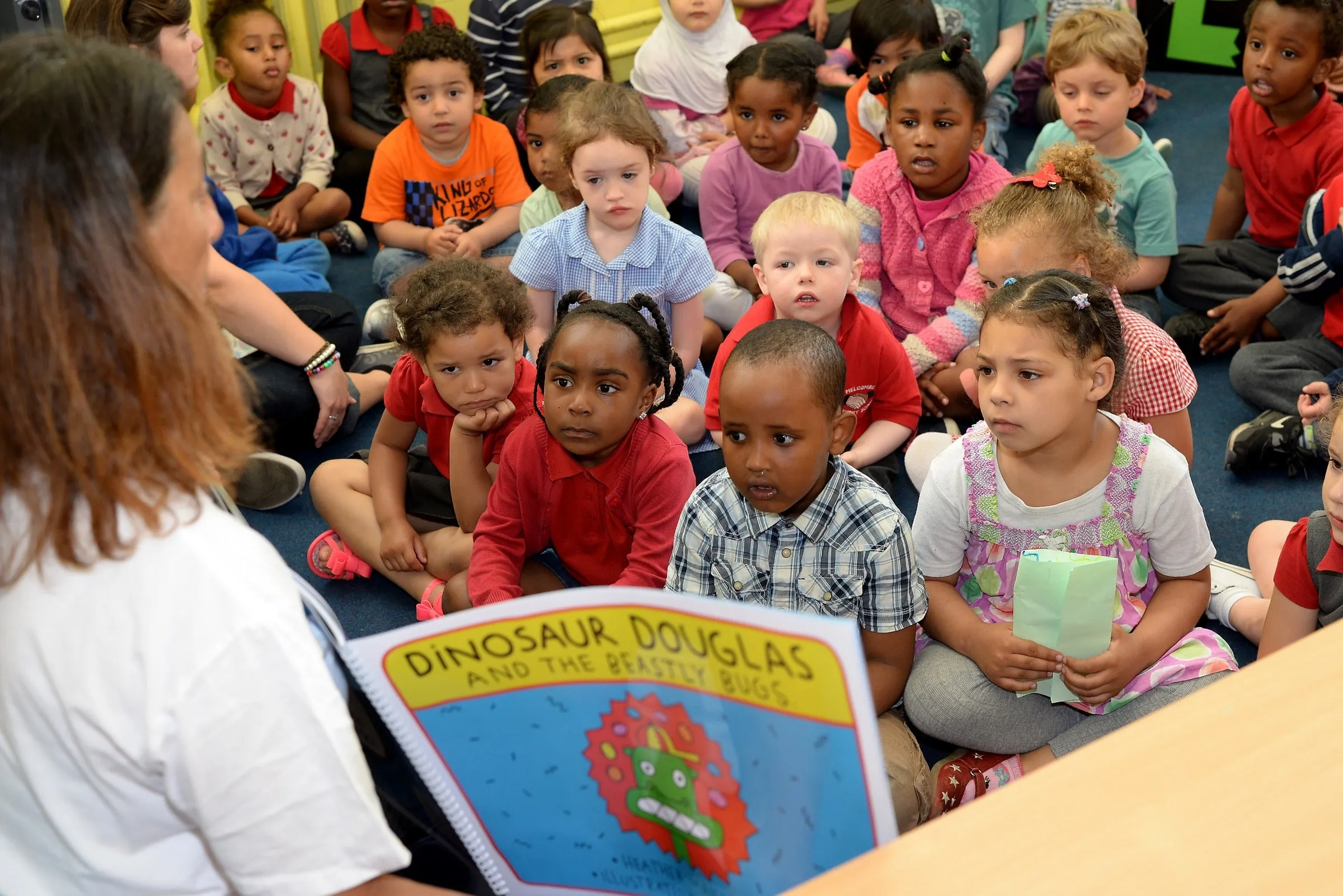 Heather Maisner reading Dinosaur Douglas and the Beastly Bugs to a class of young children